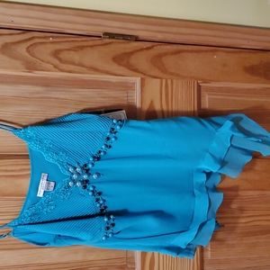 Biana Nygard size 16, turquoise beaded shell top with adjustable straps.